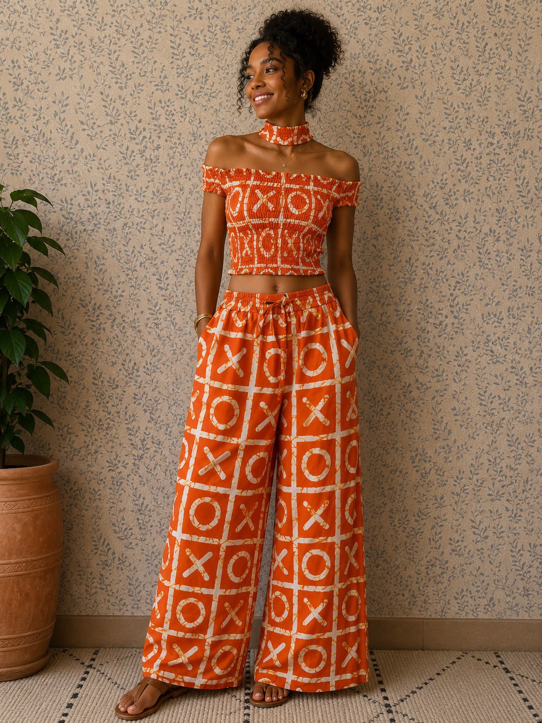 Orange XO Print Two-Piece Set – Crop Top & Wide-Leg Trousers