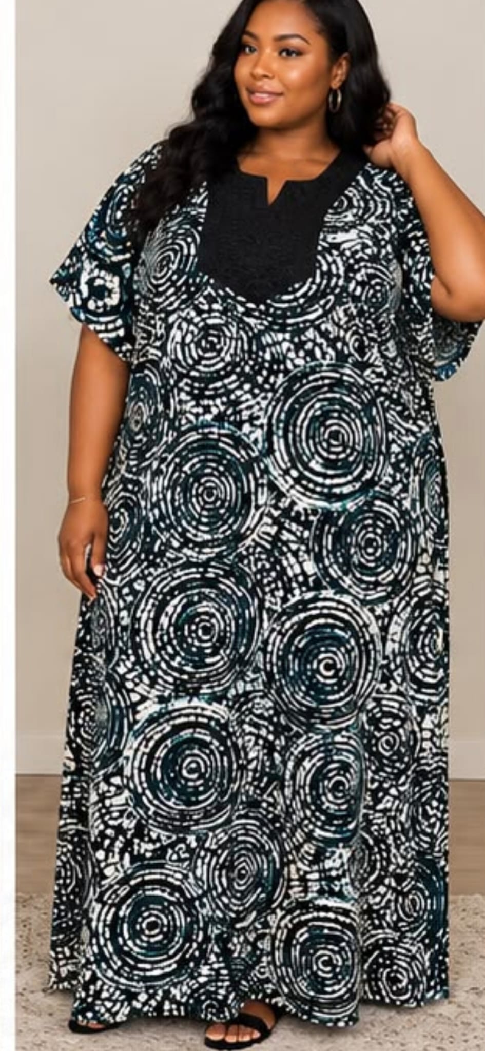 Women’s black and white circular print maxi dress with contrasting black V-neck panel